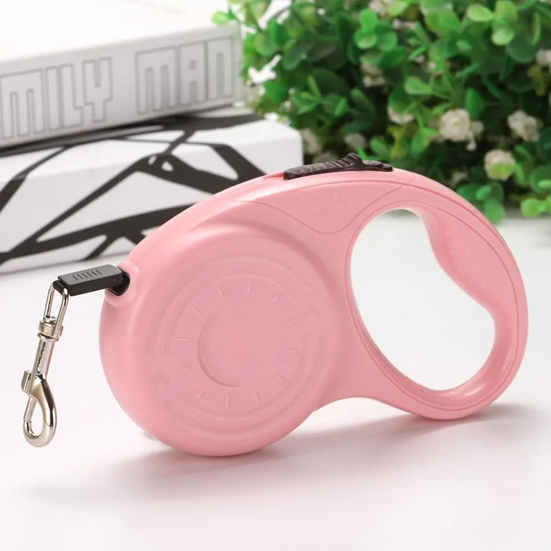 laisse enrouleur couleur rose.