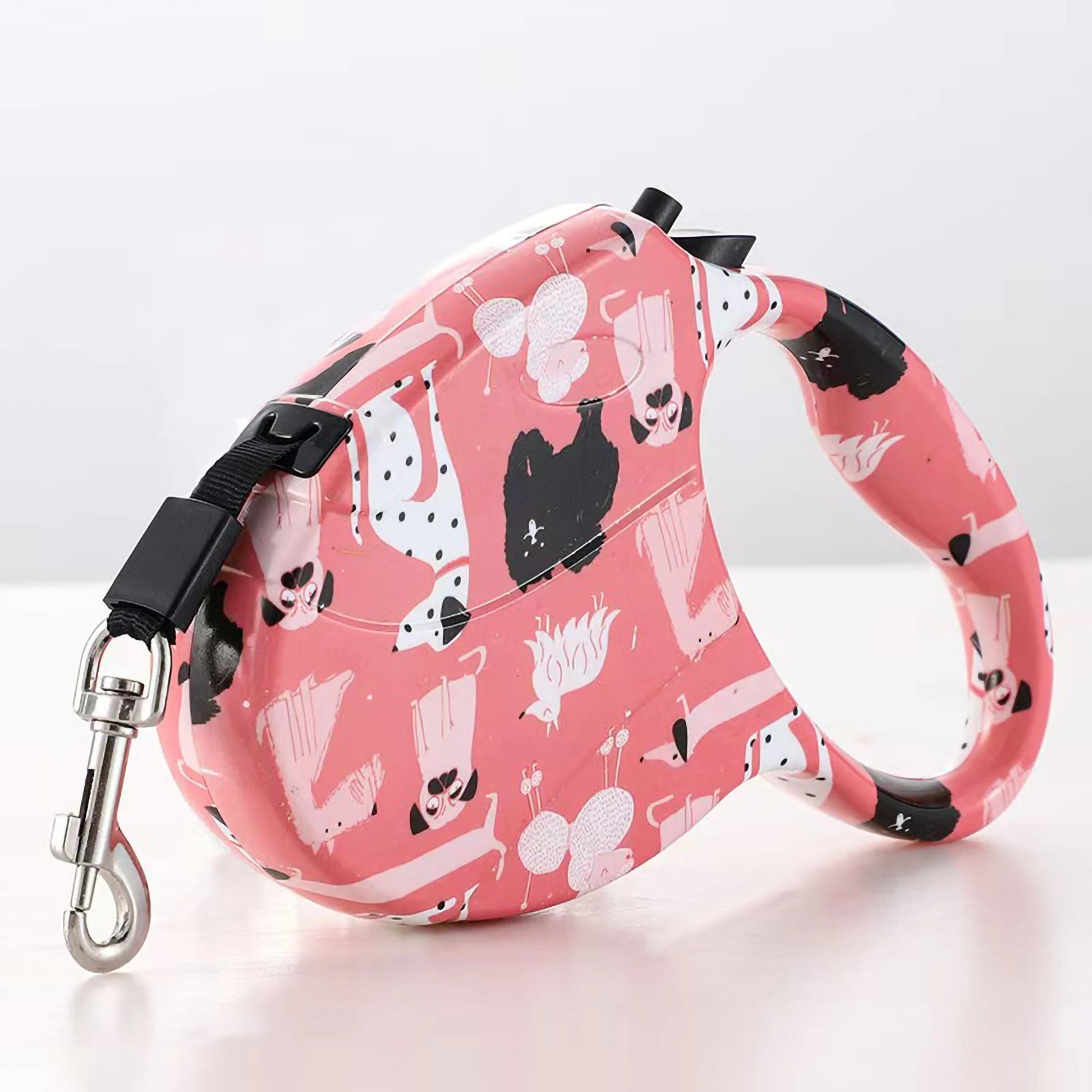 laisse enrouleur motif chien rose