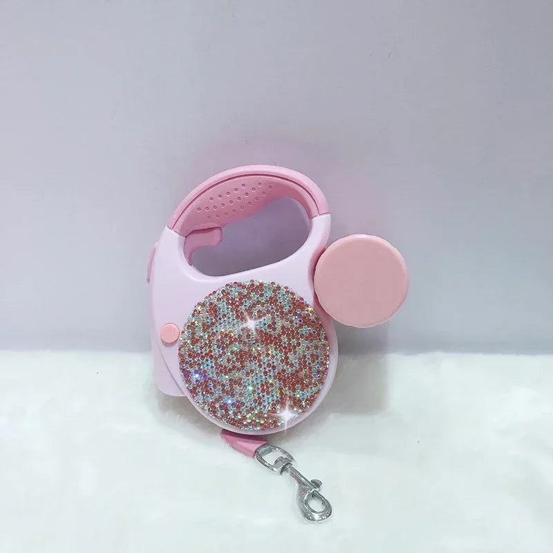 laisse enrouleur paillettes et sac rose