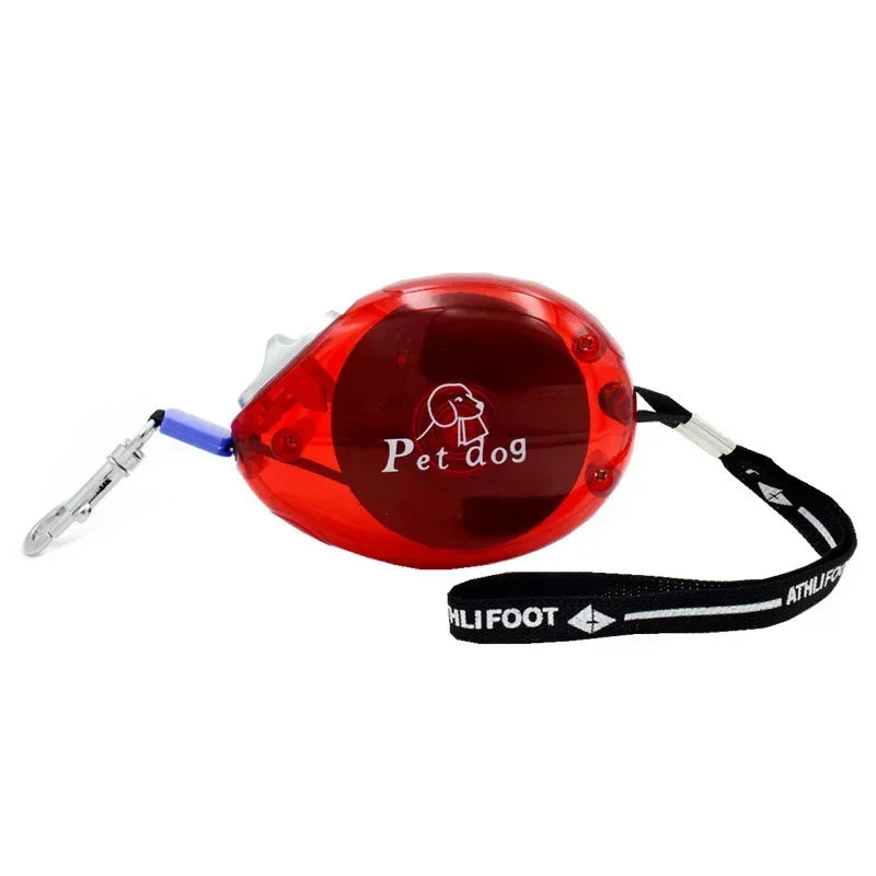 laisse enrouleur petit chien rouge