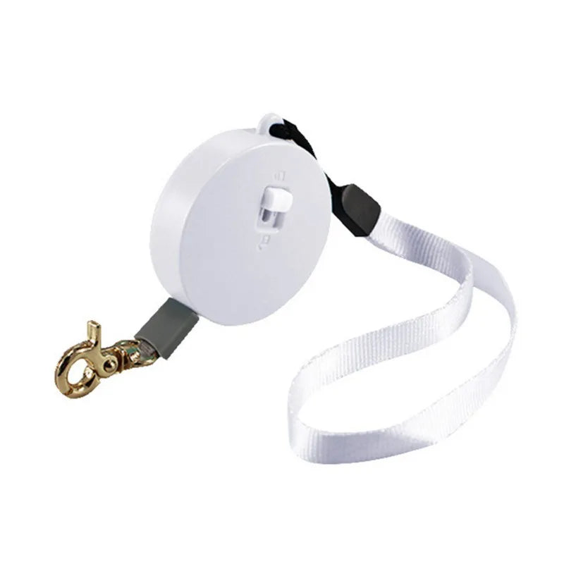 petite laisse enrouleur rond blanc