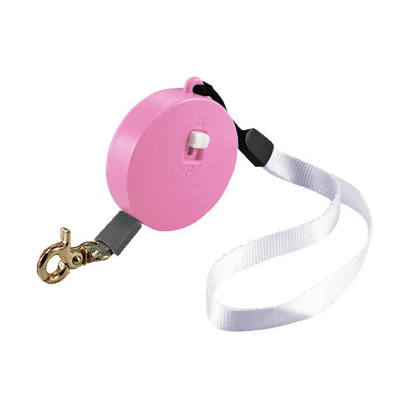 petite laisse enrouleur rond rose